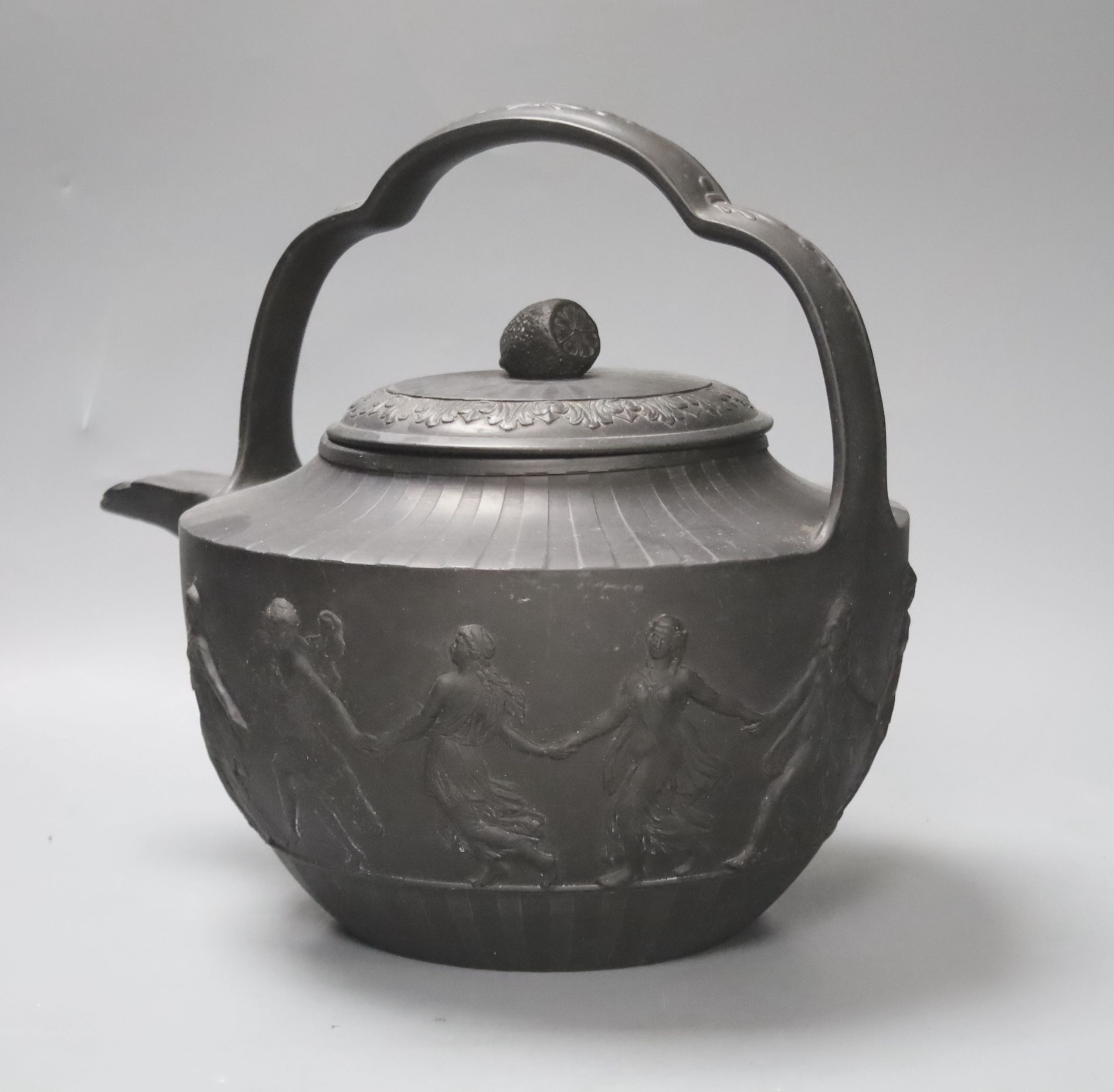 An unusually large Wedgwood black basalt teapot and associated cover, c.1800, 25cm